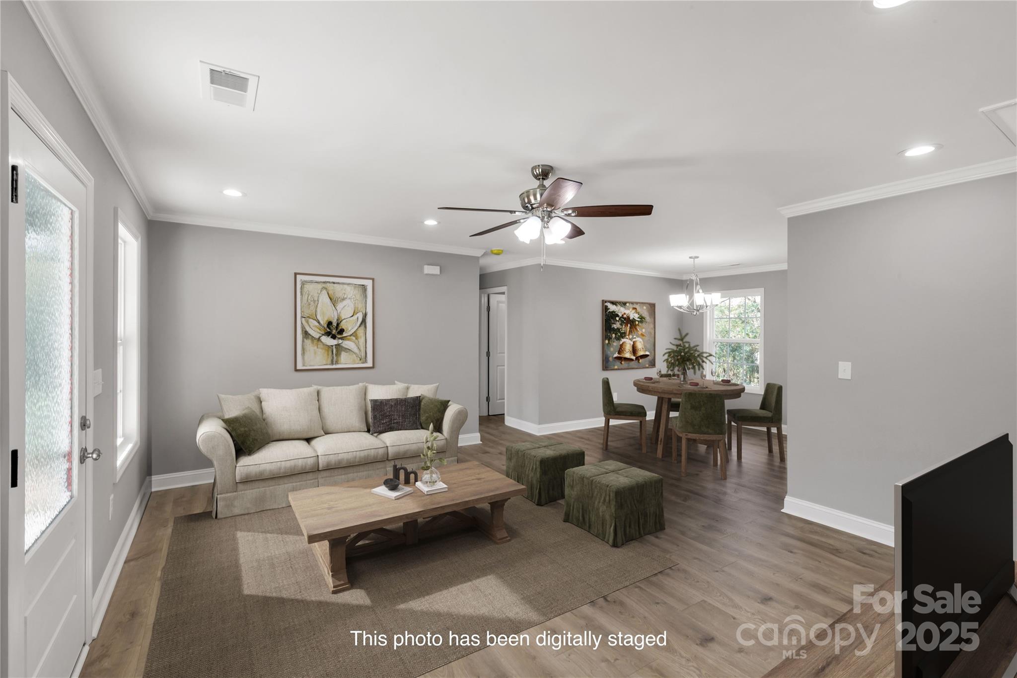 2166 Reeves Road Lancaster, SC 29720 - Photo 7 of 32 a living room with furniture and a flat screen tv