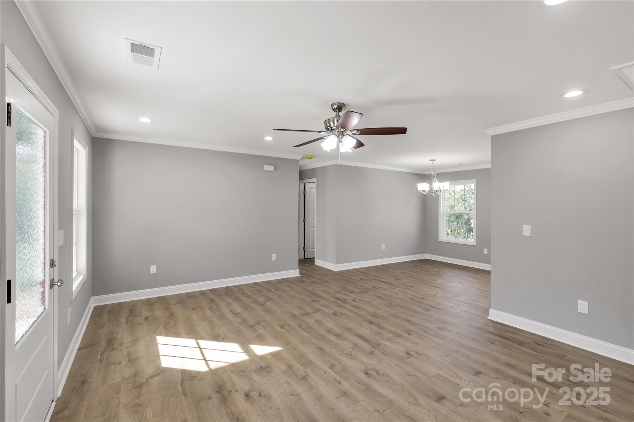 2166 Reeves Road Lancaster, SC 29720 - Photo 8 of 32 wooden floor in an empty room with a window