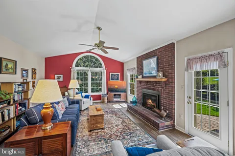 a living room with furniture and a rug