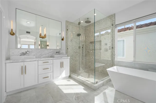 a view of a house with backyard patio and swimming pool