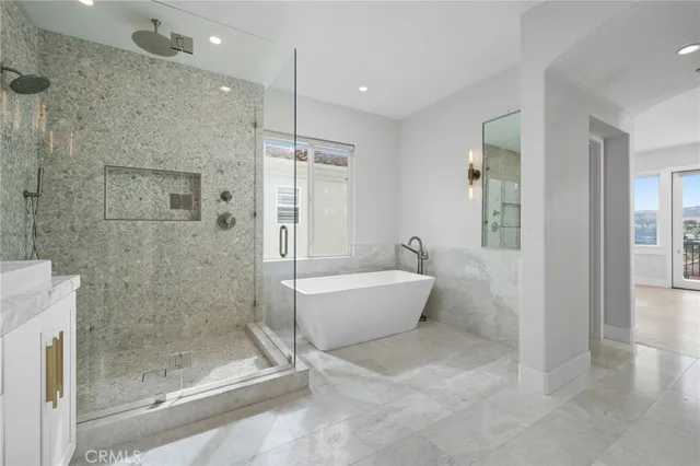 a view of a swimming pool with seating area