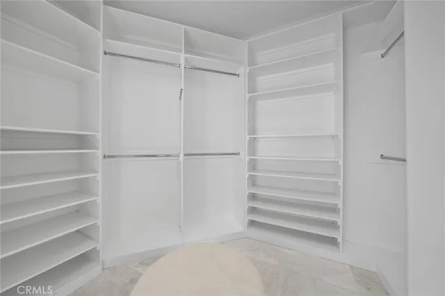 a view of a balcony with wooden floor