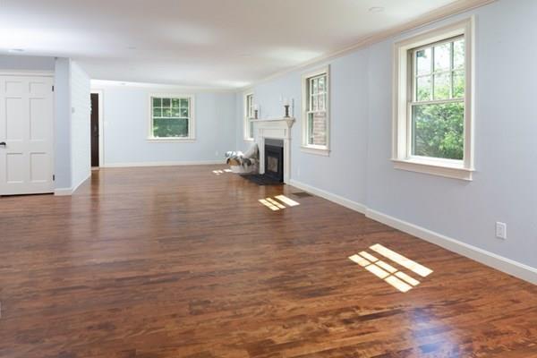 25 Magnolia Road Milton, MA 02186 - Photo 5 of 28 a view of empty room with wooden floor and fan
