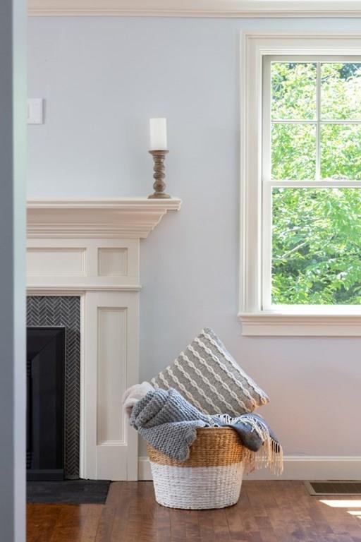 25 Magnolia Road Milton, MA 02186 - Photo 7 of 28 a view of a chair in a room