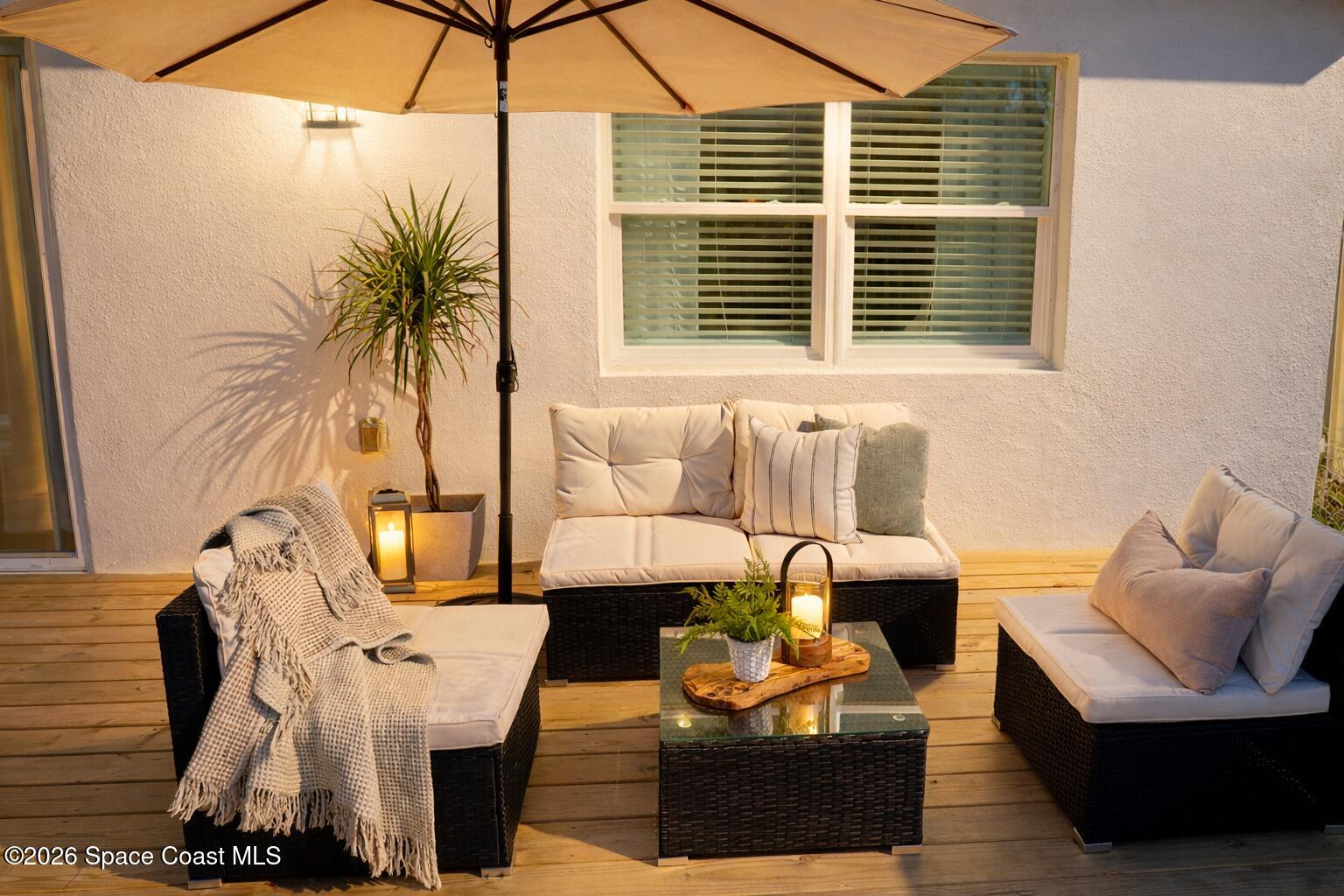 804 Oak Street Melbourne Beach, FL 32951 - Photo 15 of 51 a living room with furniture and a window