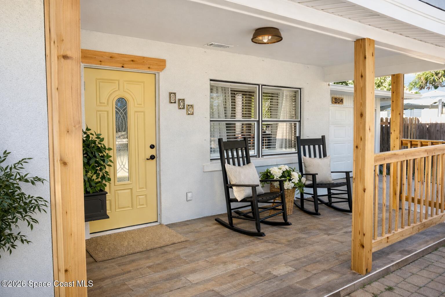 804 Oak Street Melbourne Beach, FL 32951 - Photo 46 of 51 an outdoor space view with chairs and front door