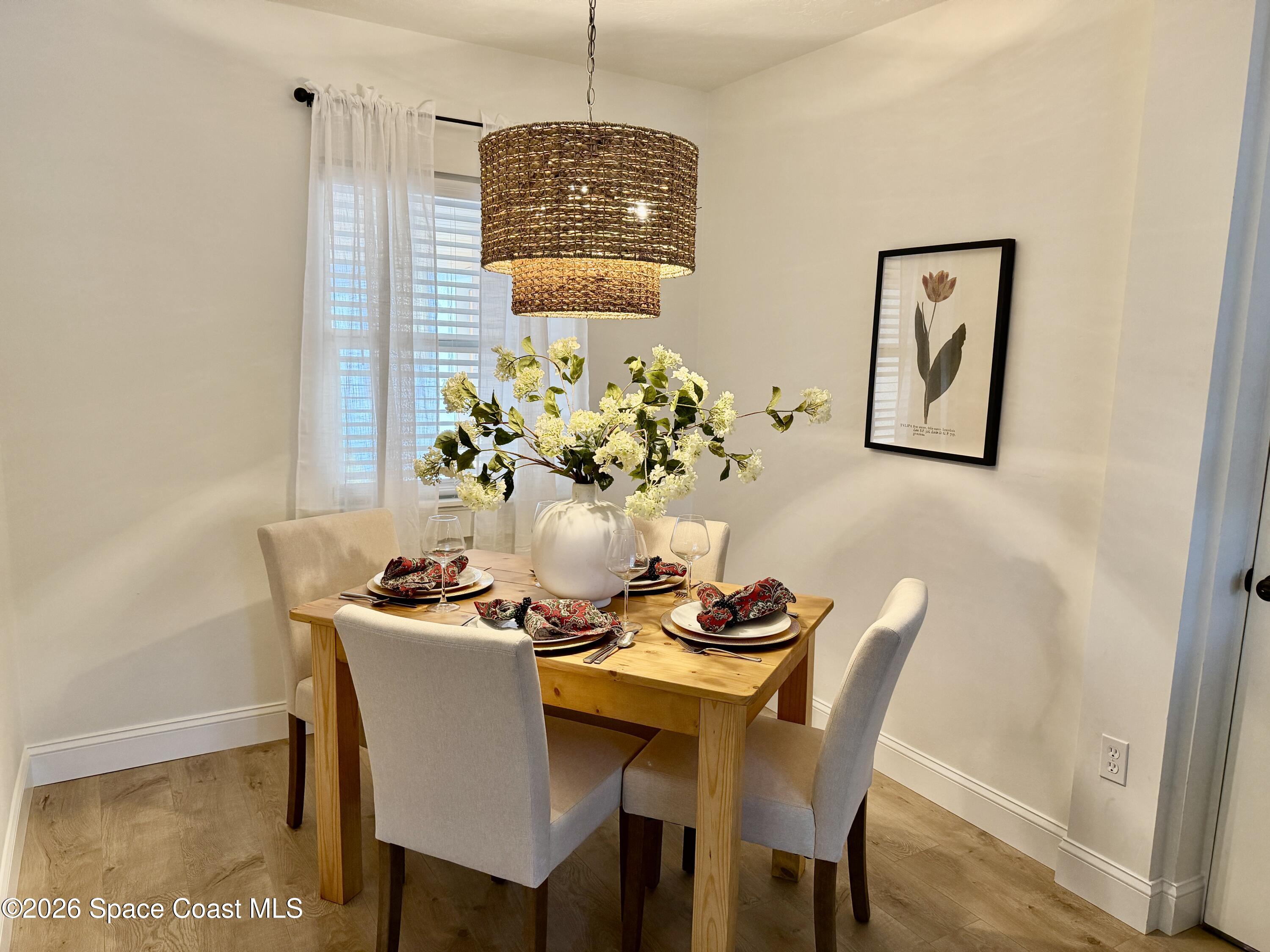 804 Oak Street Melbourne Beach, FL 32951 - Photo 6 of 51 a dining room with furniture and window