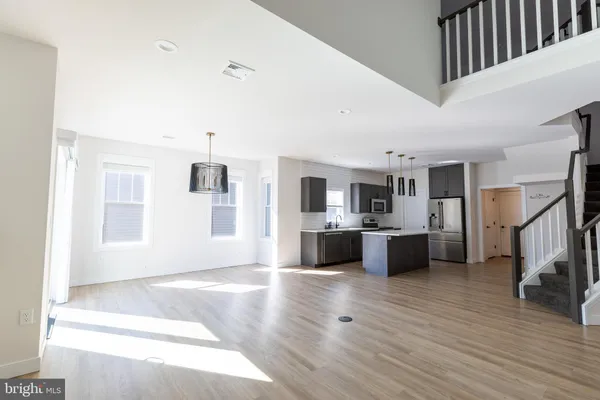 a view of a kitchen with a sink