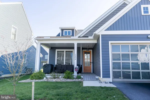 a view of front a house with a yard