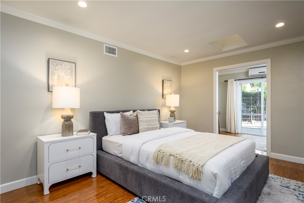 452 West Winnie Way Arcadia, CA 91007 - Photo 16 of 25 a bedroom with a large bed and a window