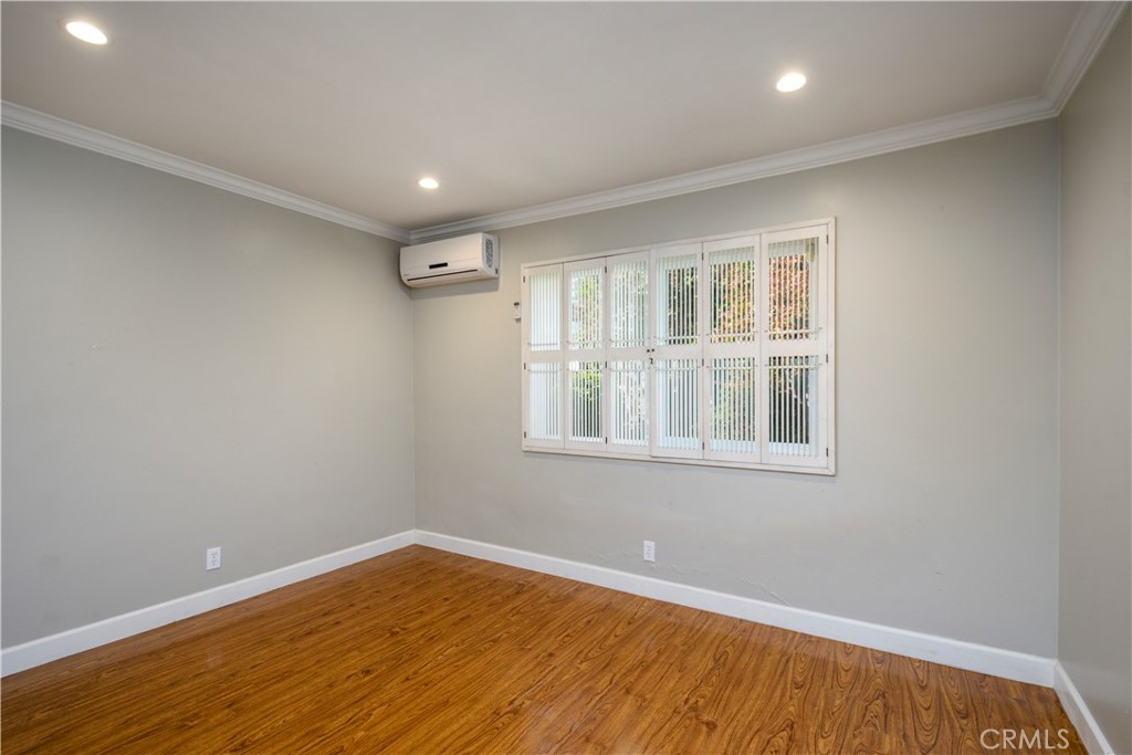 452 West Winnie Way Arcadia, CA 91007 - Photo 21 of 25 a view of empty room with wooden floor and fan