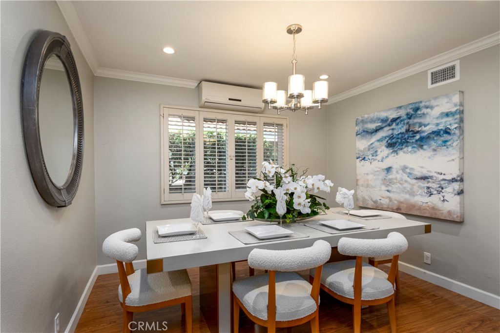 452 West Winnie Way Arcadia, CA 91007 - Photo 3 of 25 a view of a dining room with furniture wooden floor and chandelier