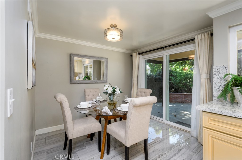 452 West Winnie Way Arcadia, CA 91007 - Photo 7 of 25 a dining room with furniture wooden floor and a chandelier
