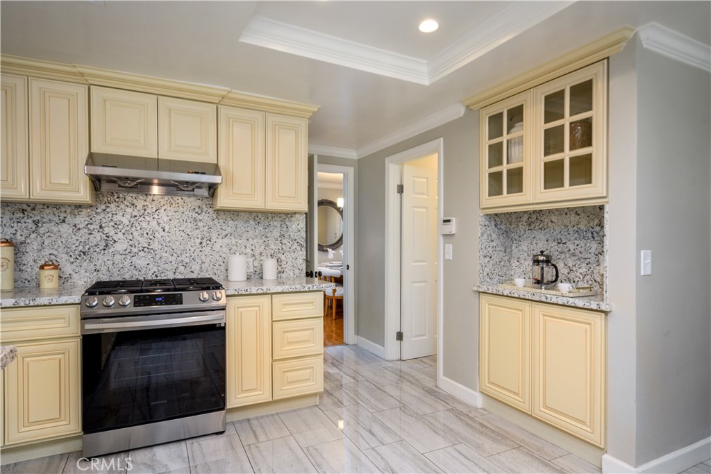 452 West Winnie Way Arcadia, CA 91007 - Photo 9 of 25 a kitchen with a stove and a microwave