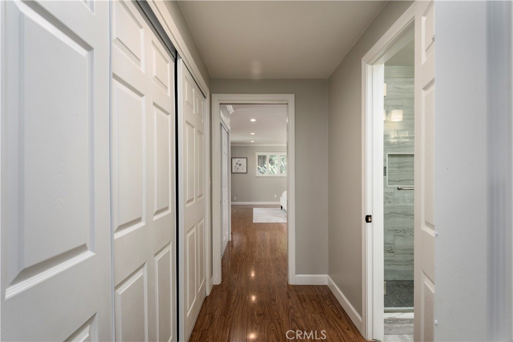 452 West Winnie Way Arcadia, CA 91007 - Photo 10 of 25 a view of a hallway with wooden floor and staircase
