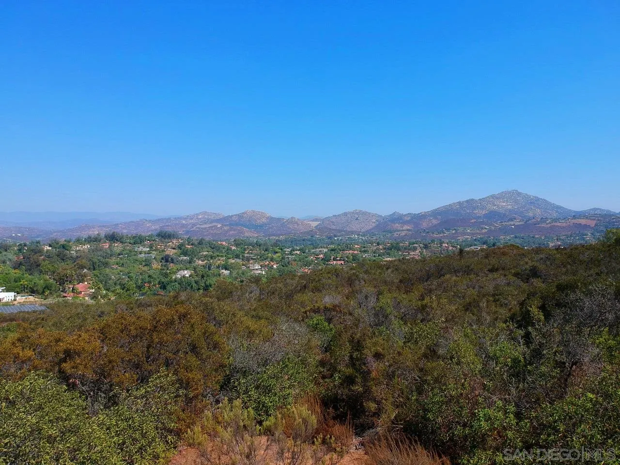 7 Del Poniente Road, Unit 7 Poway, CA 92064 - Photo 17 of 26 a view of a lush green field