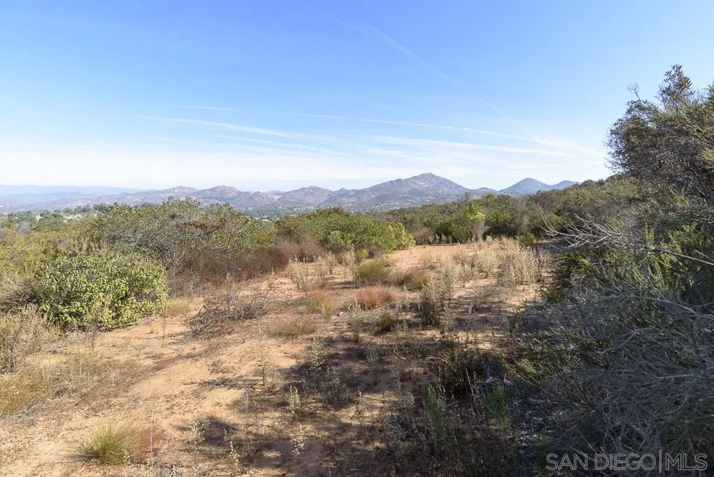 7 Del Poniente Road, Unit 7 Poway, CA 92064 - Photo 2 of 26 a view of mountain with sunset in background