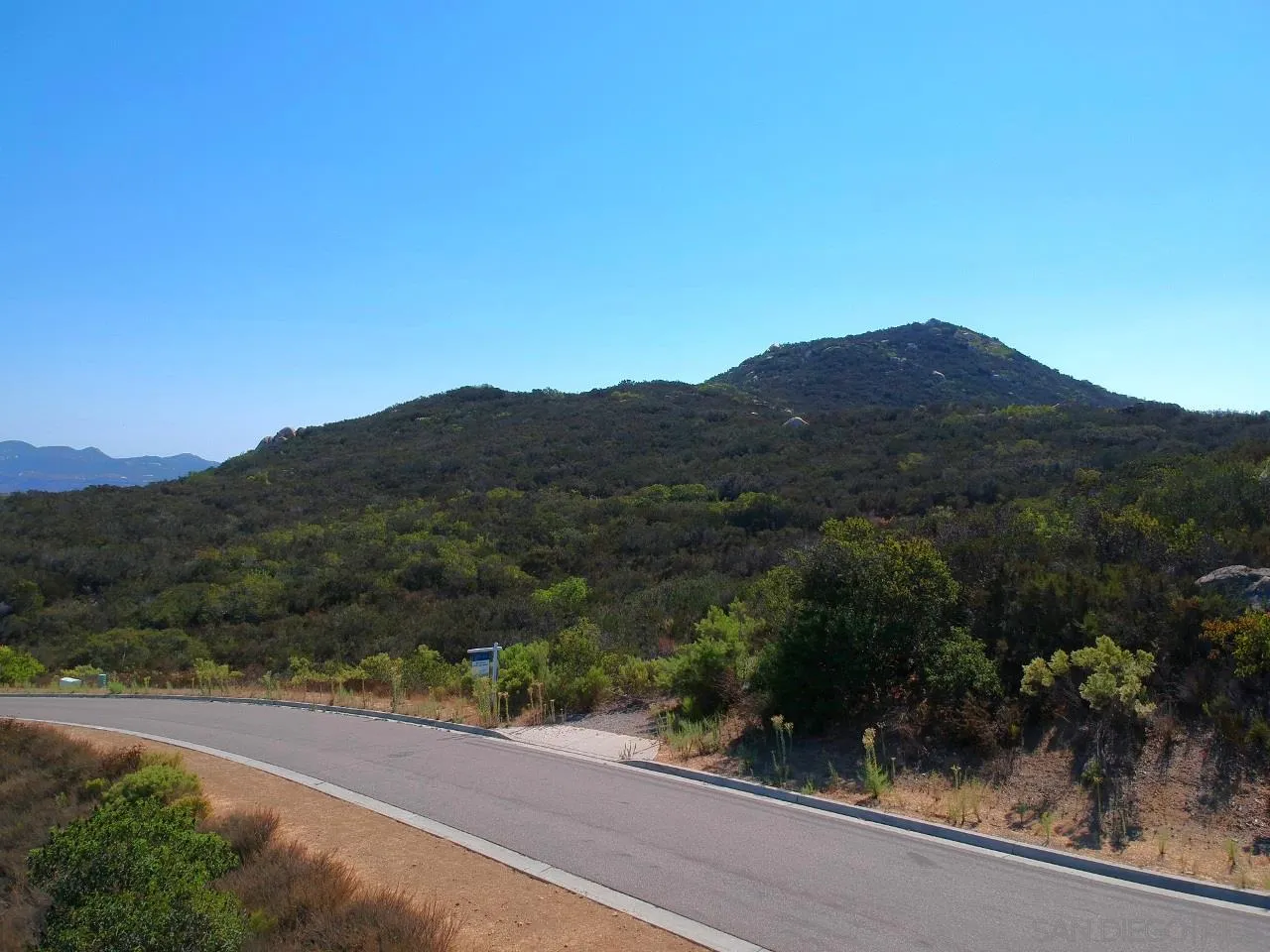 7 Del Poniente Road, Unit 7 Poway, CA 92064 - Photo 21 of 26 a view of a mountain with a outdoor space