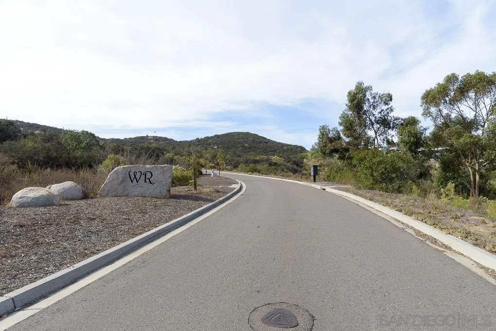 7 Del Poniente Road, Unit 7 Poway, CA 92064 - Photo 23 of 26 a view of a road with mountain view