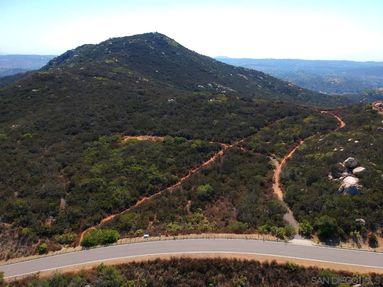 7 Del Poniente Road, Unit 7 Poway, CA 92064 - Photo 9 of 26 a view of a forest with mountains in the background