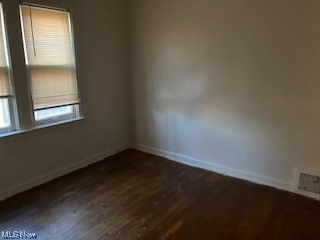 1508 Genesee Road South Euclid, OH 44121 - Photo 11 of 12 Empty room with dark hardwood floors