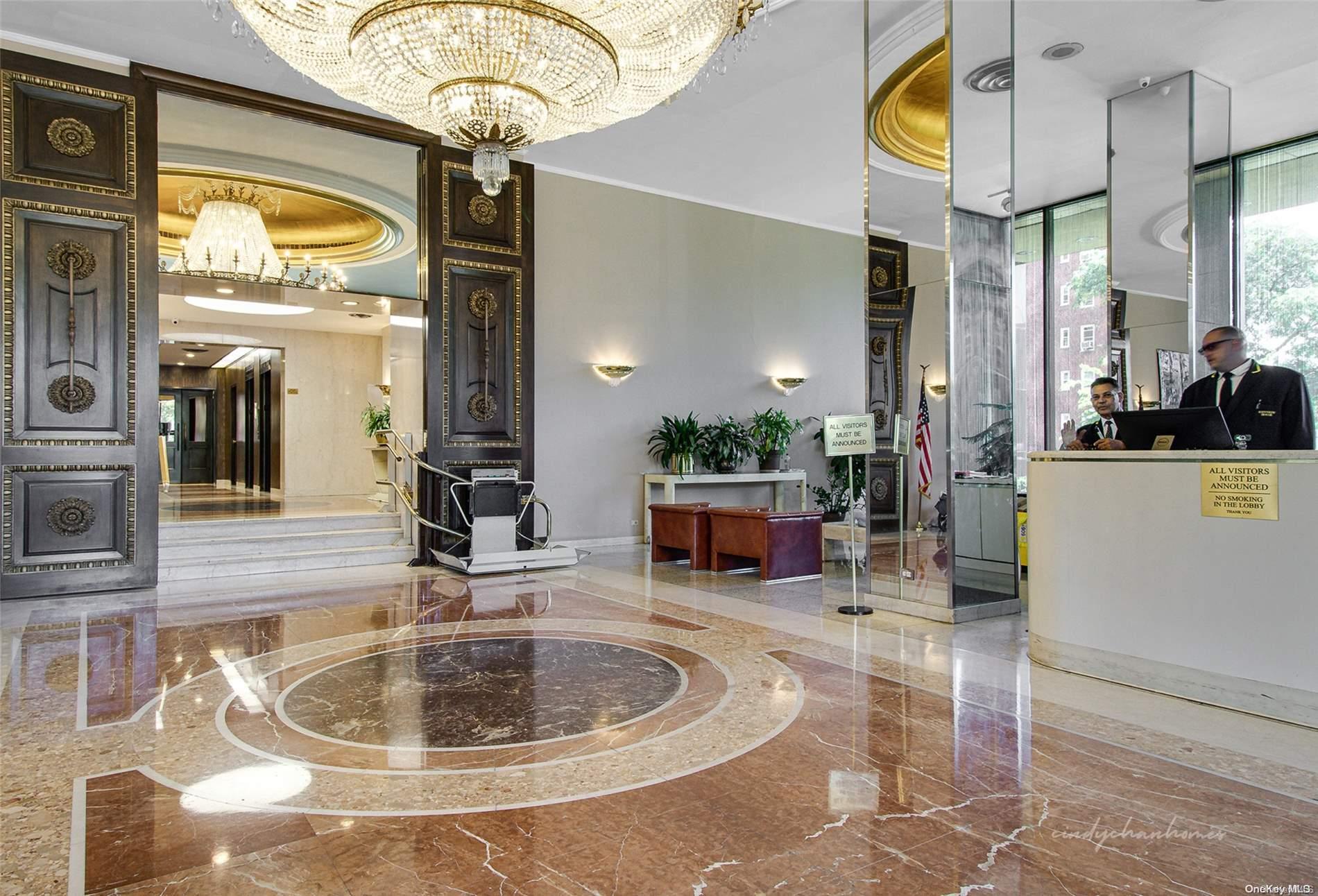110-11 Queens Boulevard, Unit 20K Queens, NY 11375 - Photo 2 of 35 a lobby with furniture and a chandelier