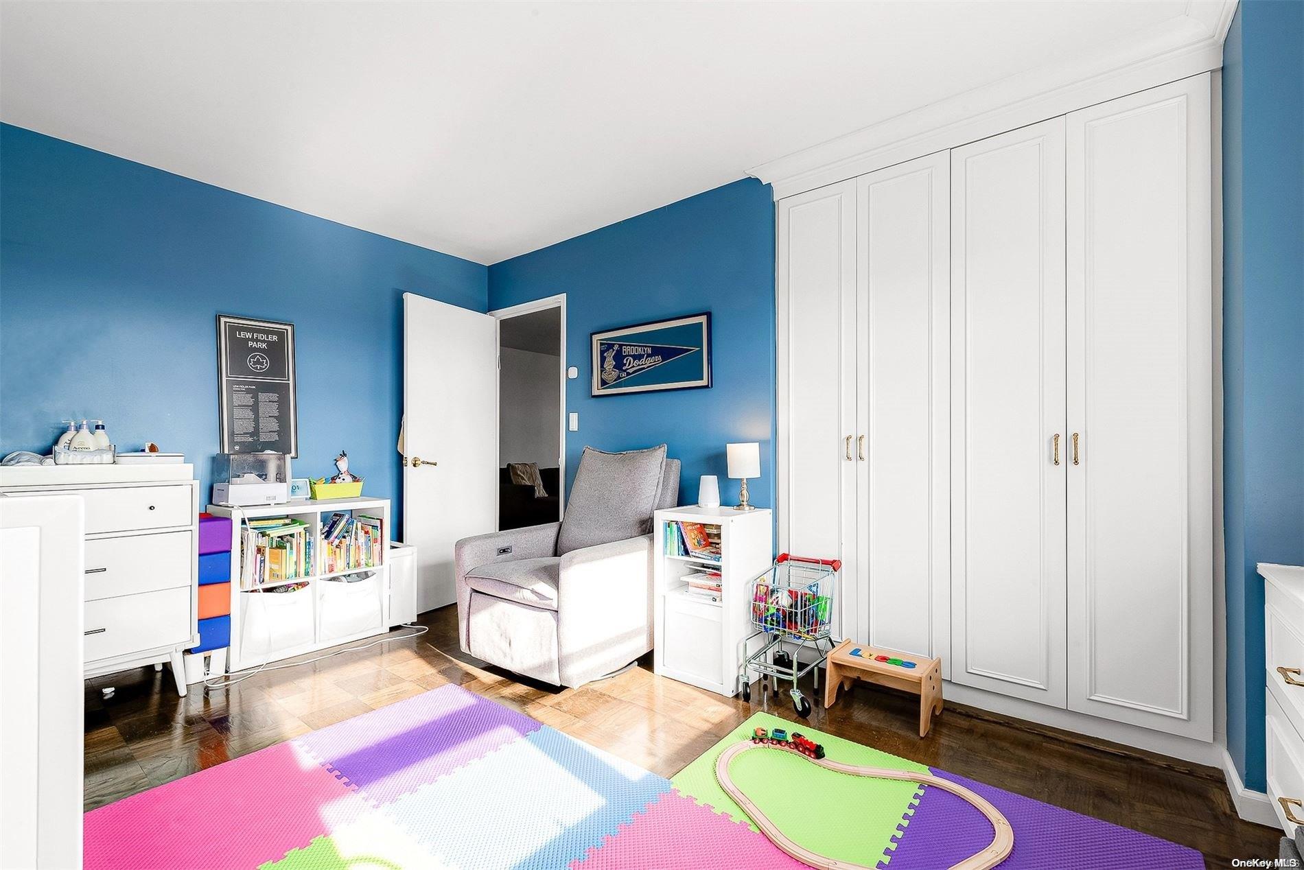 110-11 Queens Boulevard, Unit 20K Queens, NY 11375 - Photo 23 of 35 a bed room with a bed and a window