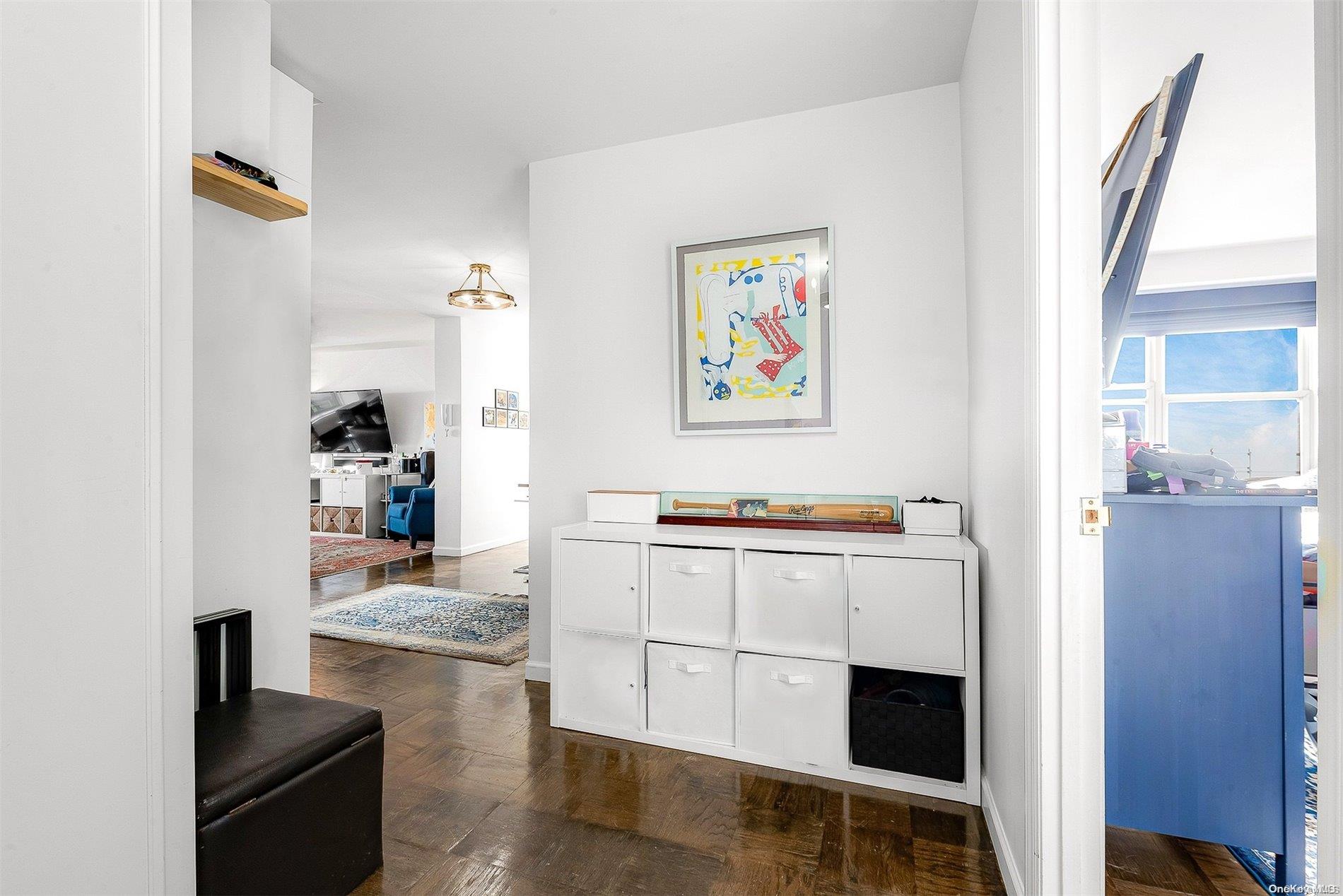 110-11 Queens Boulevard, Unit 20K Queens, NY 11375 - Photo 3 of 35 a view of kitchen with stainless steel appliances wooden floor and chair