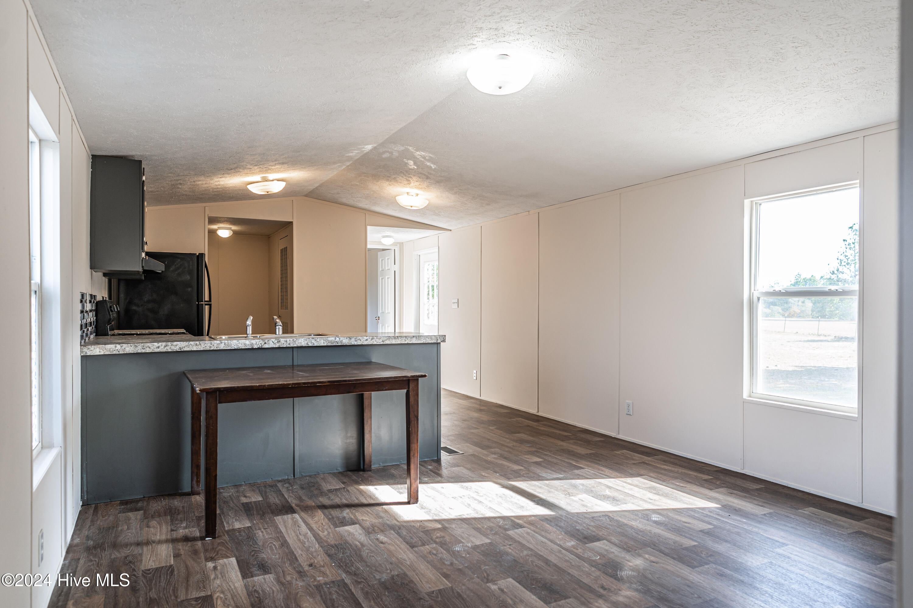 1906 McDonald Church Road Hoffman, NC 28347 - Photo 8 of 23 Living and dining area