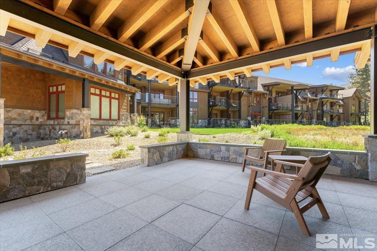 9 Beach Club Drive, Unit 111 Stateline, NV 89449 - Photo 19 of 40 a view of a chairs and table in the patio