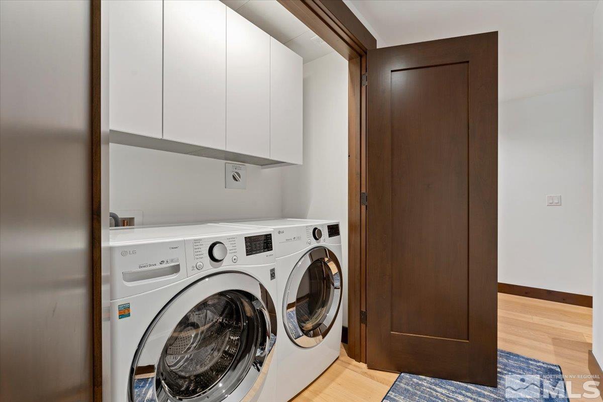 9 Beach Club Drive, Unit 111 Stateline, NV 89449 - Photo 22 of 40 a utility room with dryer and washer