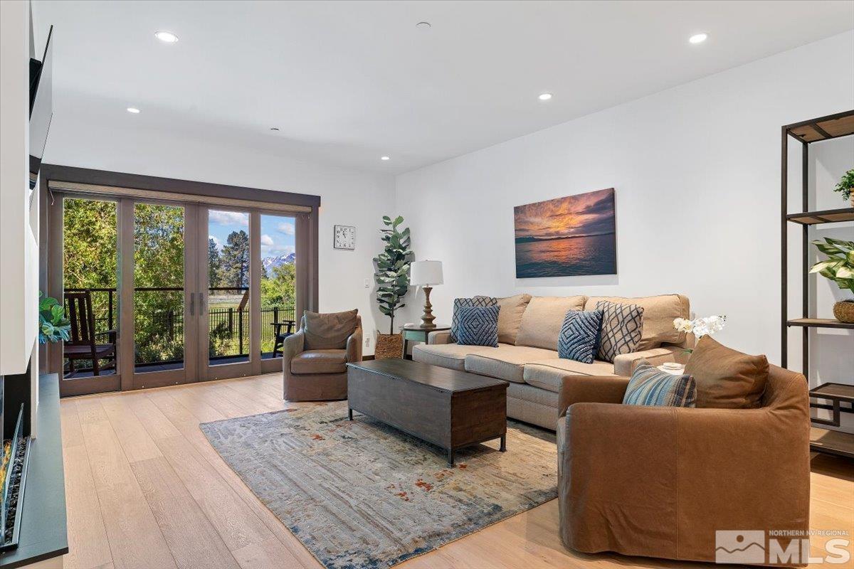 9 Beach Club Drive, Unit 111 Stateline, NV 89449 - Photo 3 of 40 a living room with furniture and a large window