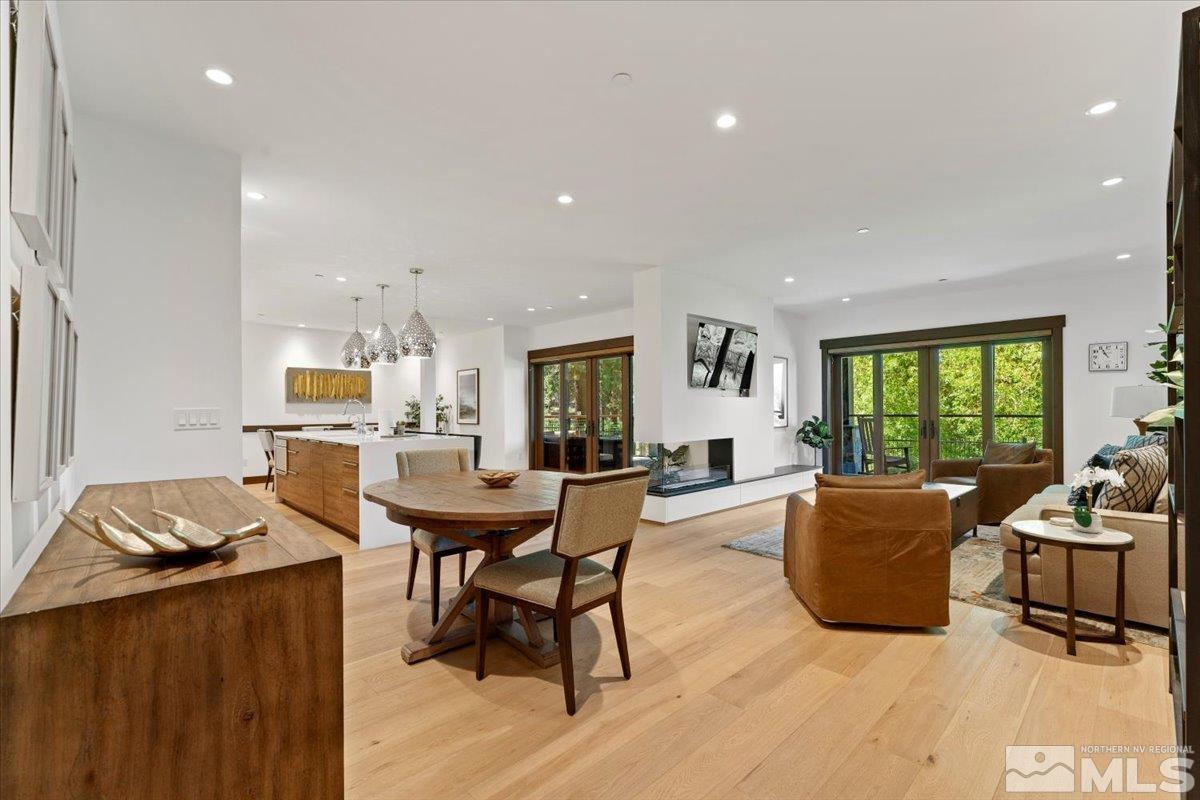 9 Beach Club Drive, Unit 111 Stateline, NV 89449 - Photo 5 of 40 a living room with furniture and a large window