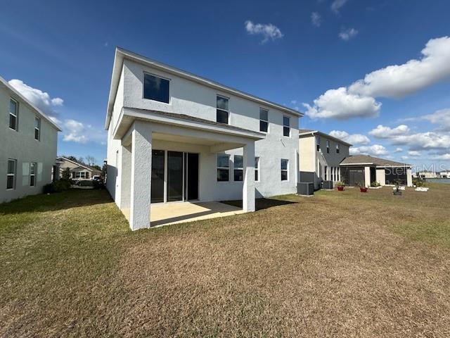 5644 Flagstone Trail Palmetto, FL 34221 - Photo 24 of 25 a view of a house with a big yard