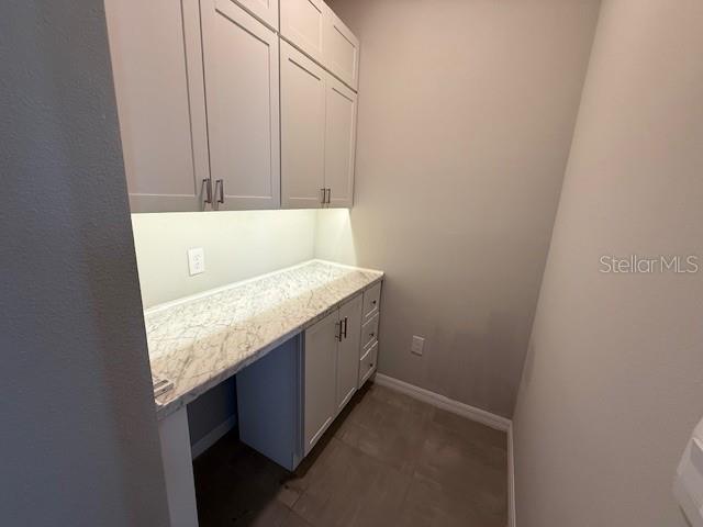 5644 Flagstone Trail Palmetto, FL 34221 - Photo 10 of 25 a bathroom with a granite countertop sink and a mirror