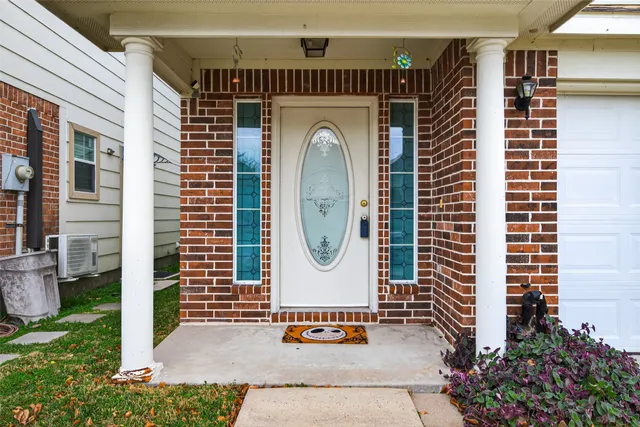 a view of a hallway with entryway