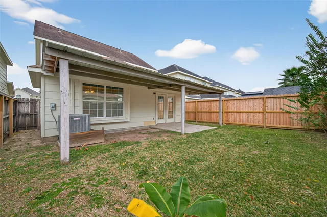 a view of backyard with green space