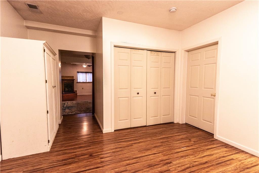 210 Whitestown Road Butler, PA 16001 - Photo 11 of 21 a view of a hallway with wooden floor