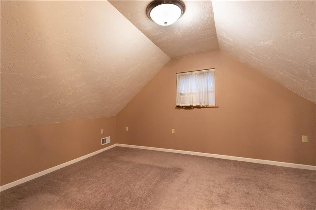 210 Whitestown Road Butler, PA 16001 - Photo 14 of 21 an empty room with windows and fan