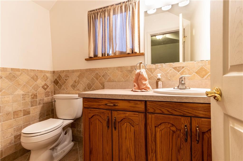 210 Whitestown Road Butler, PA 16001 - Photo 16 of 21 a bathroom with a sink and a toilet