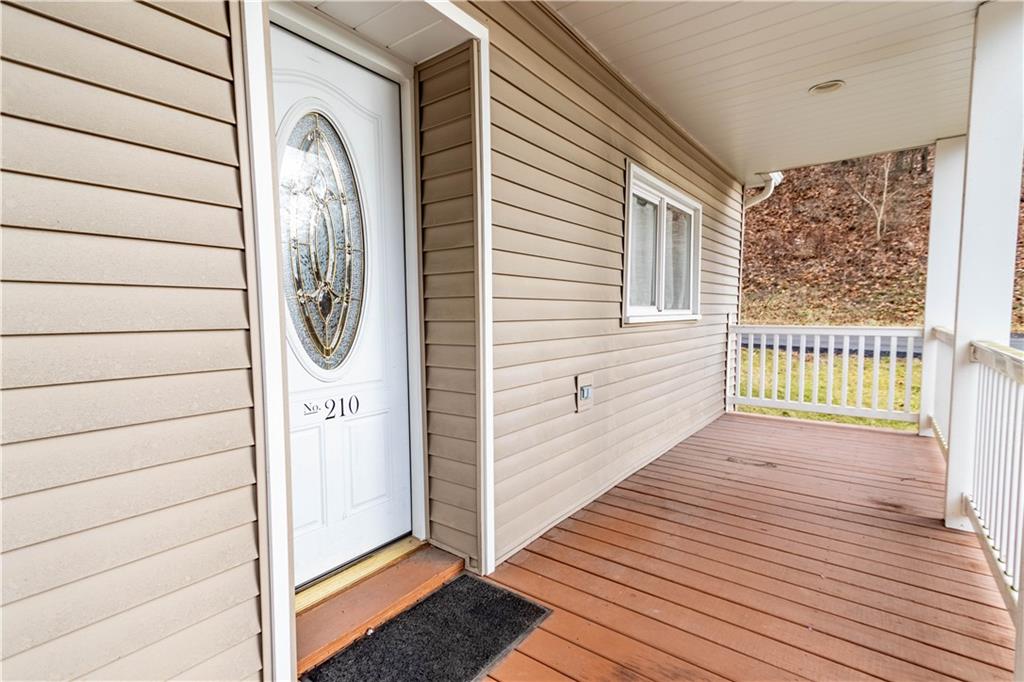 210 Whitestown Road Butler, PA 16001 - Photo 4 of 21 a view of a house with wooden floor