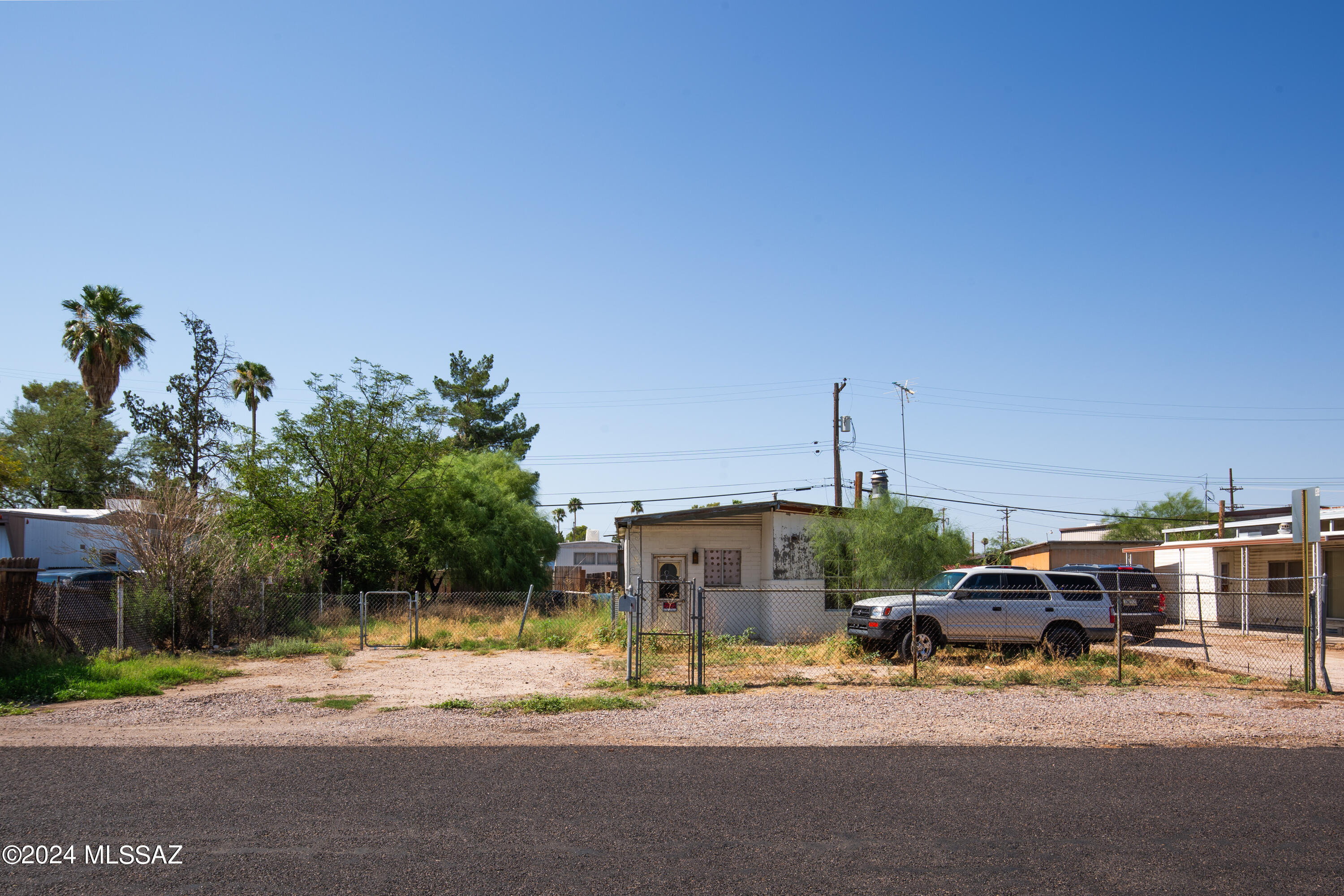 1349 West Allegheny Street Tucson, AZ 85705 - Photo 1 of 1 a car parked on the side of the road