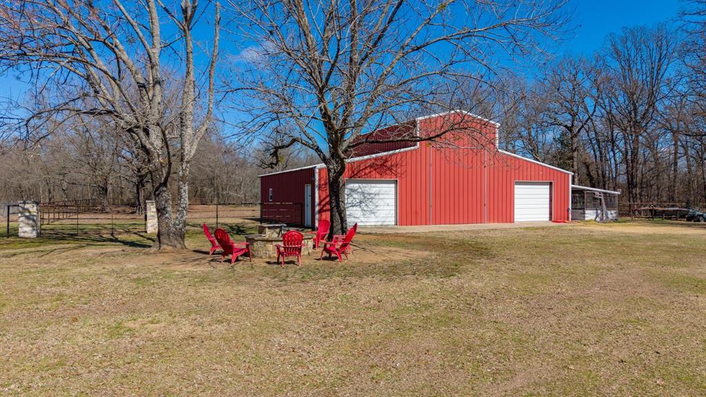 24 County Rd NW 1060 Talco, TX 75487 - Photo 36 of 40 a view of a house with a backyard
