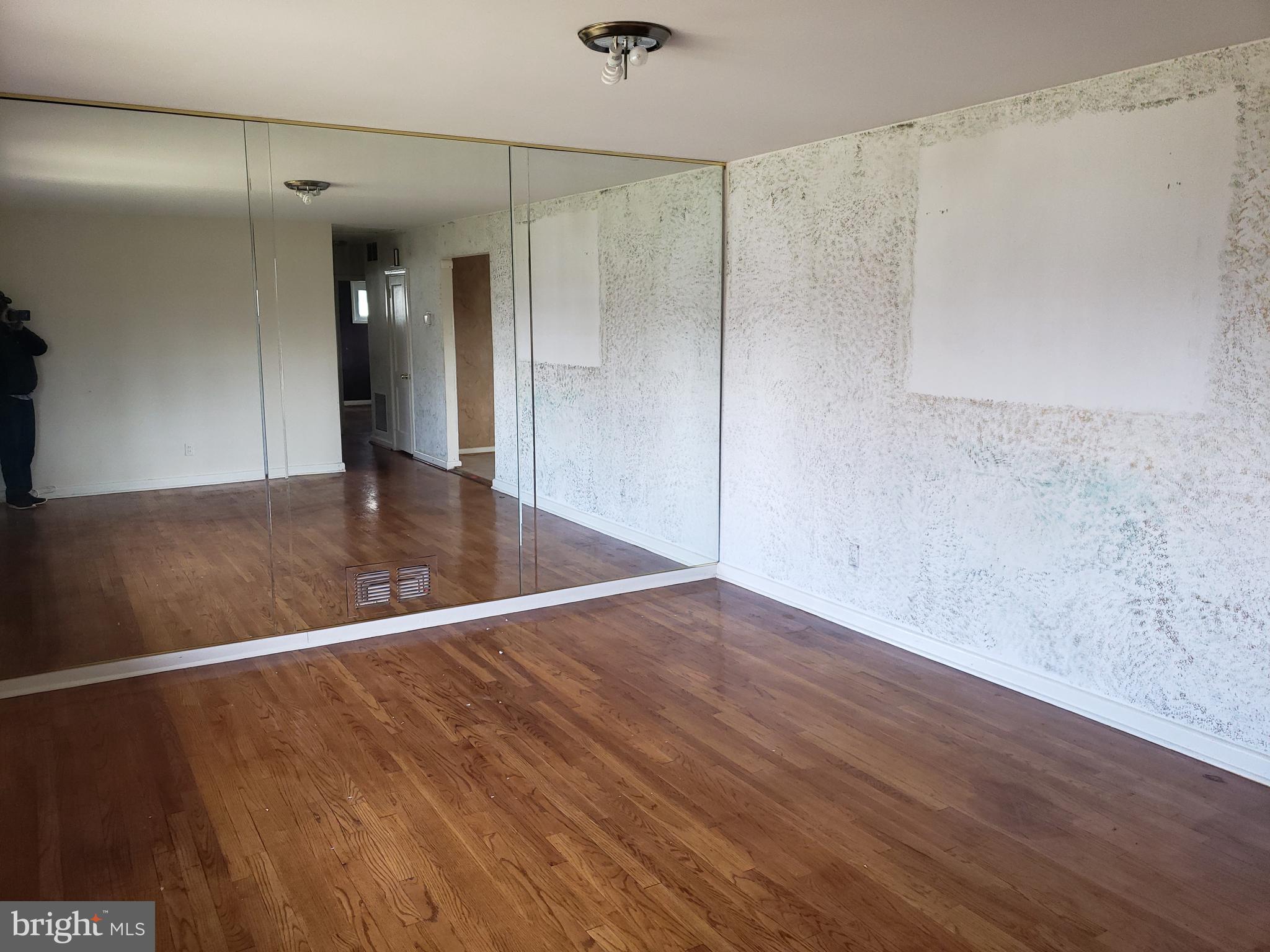 7415 Remoor Road Baltimore, MD 21207 - Photo 18 of 45 wooden floor in an empty room