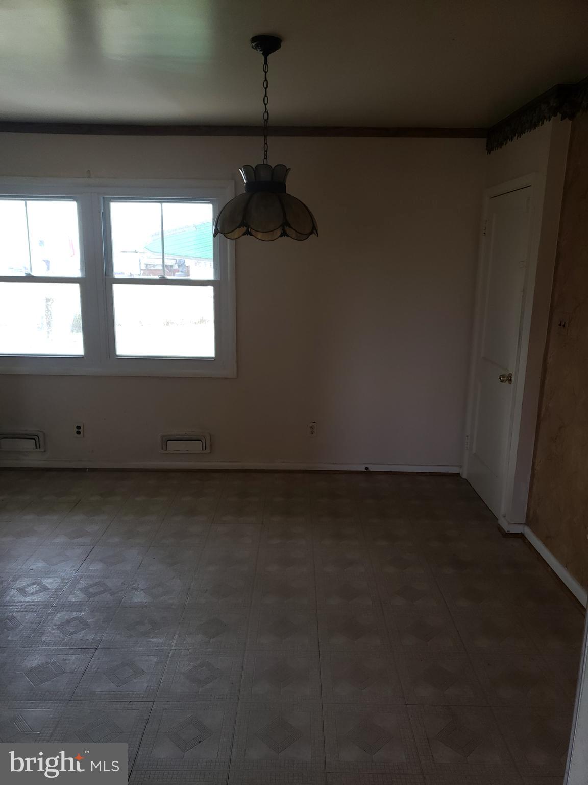7415 Remoor Road Baltimore, MD 21207 - Photo 22 of 45 a view of an empty room and window