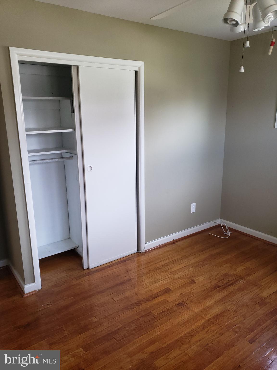 7415 Remoor Road Baltimore, MD 21207 - Photo 23 of 45 a view of empty room with wooden floor