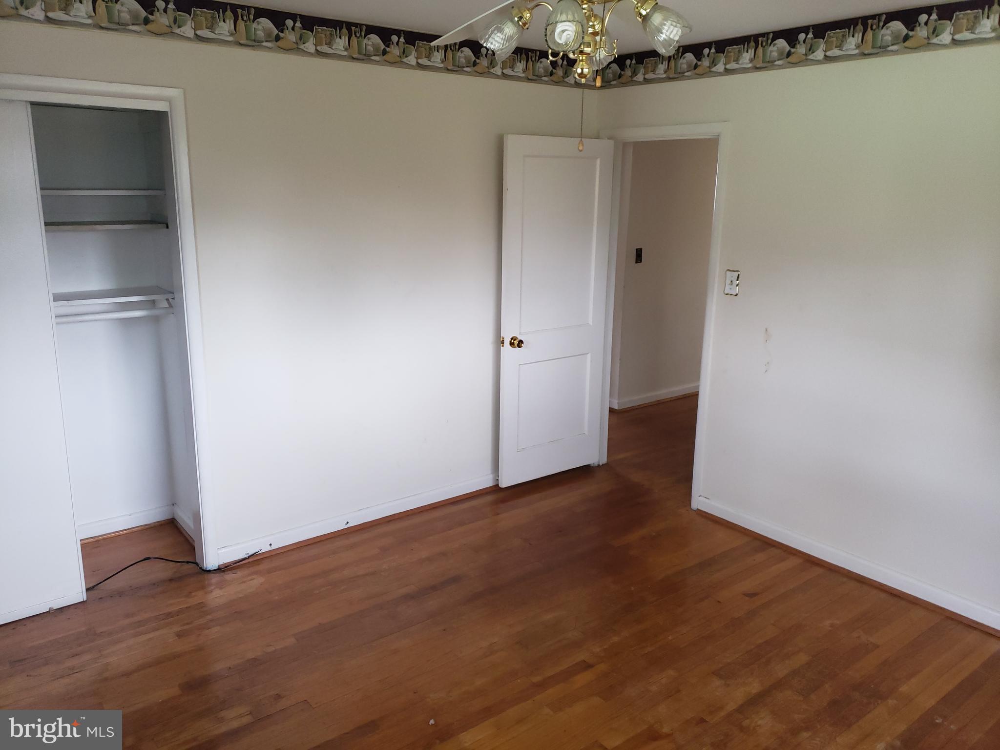 7415 Remoor Road Baltimore, MD 21207 - Photo 24 of 45 wooden floor in an empty room