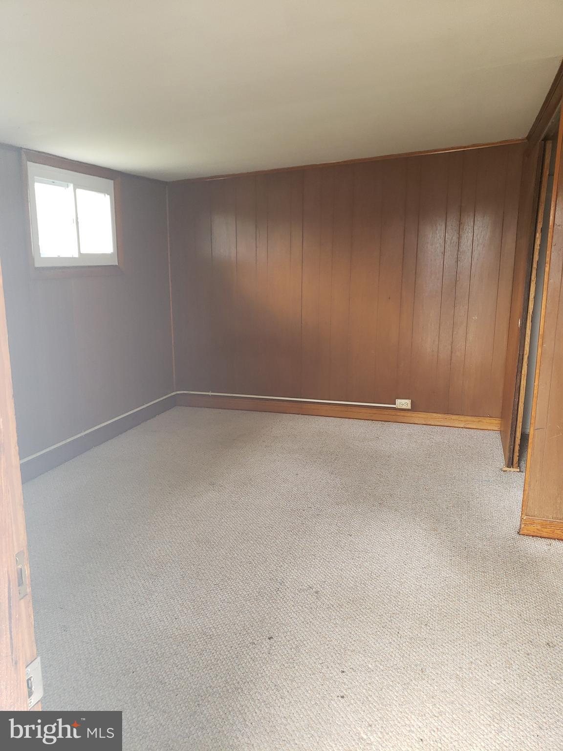 7415 Remoor Road Baltimore, MD 21207 - Photo 28 of 45 an empty room with windows