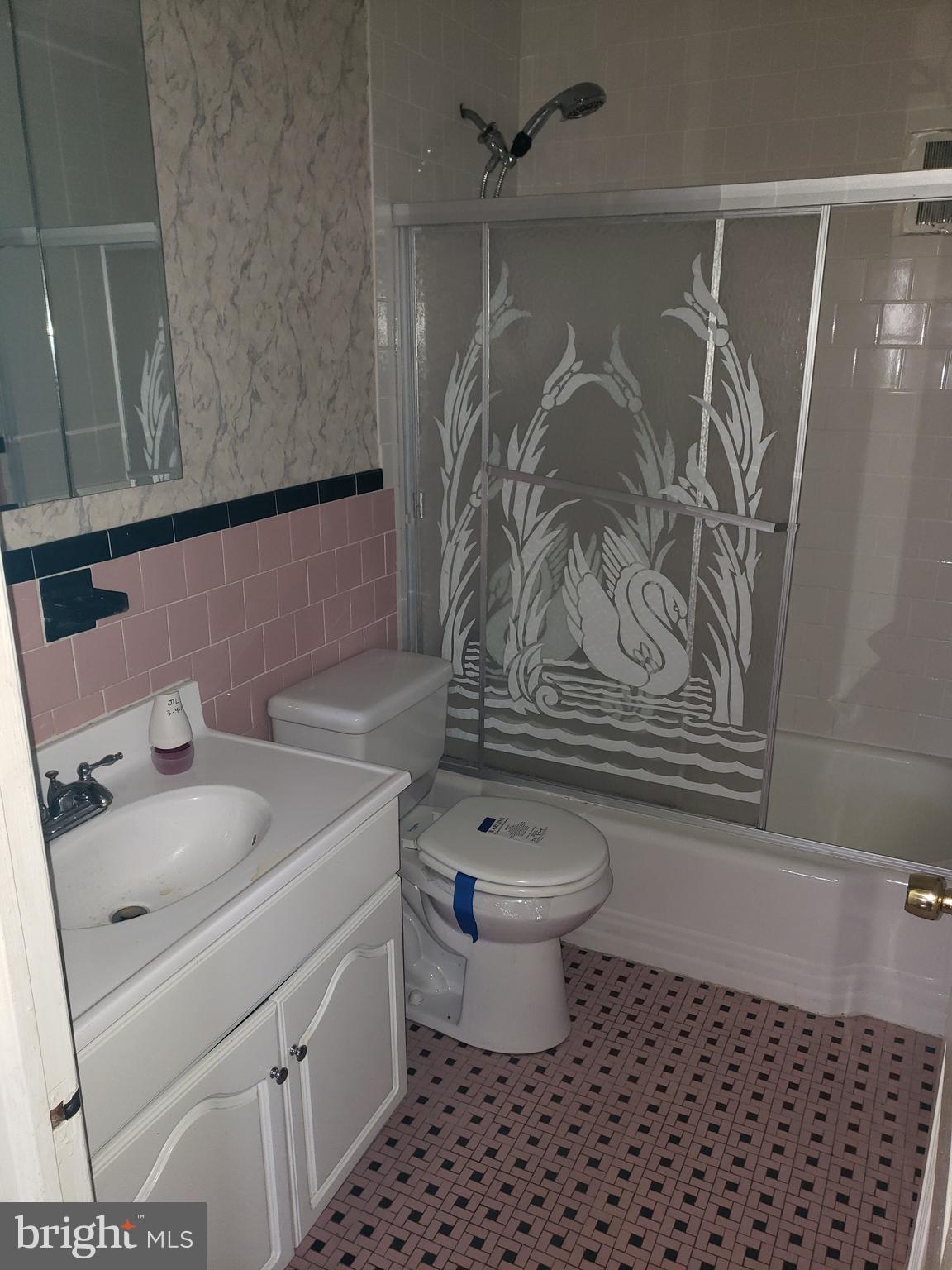 7415 Remoor Road Baltimore, MD 21207 - Photo 34 of 45 a bathroom with a sink toilet and shower