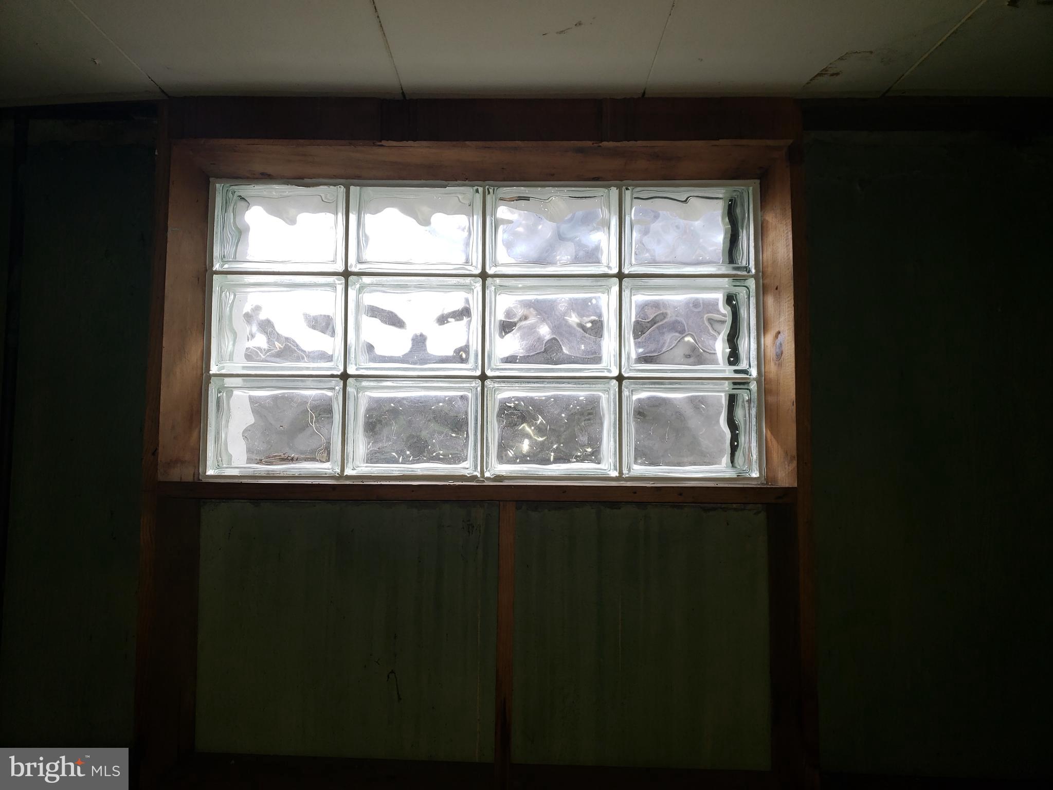 7415 Remoor Road Baltimore, MD 21207 - Photo 37 of 45 a view of window in an empty room